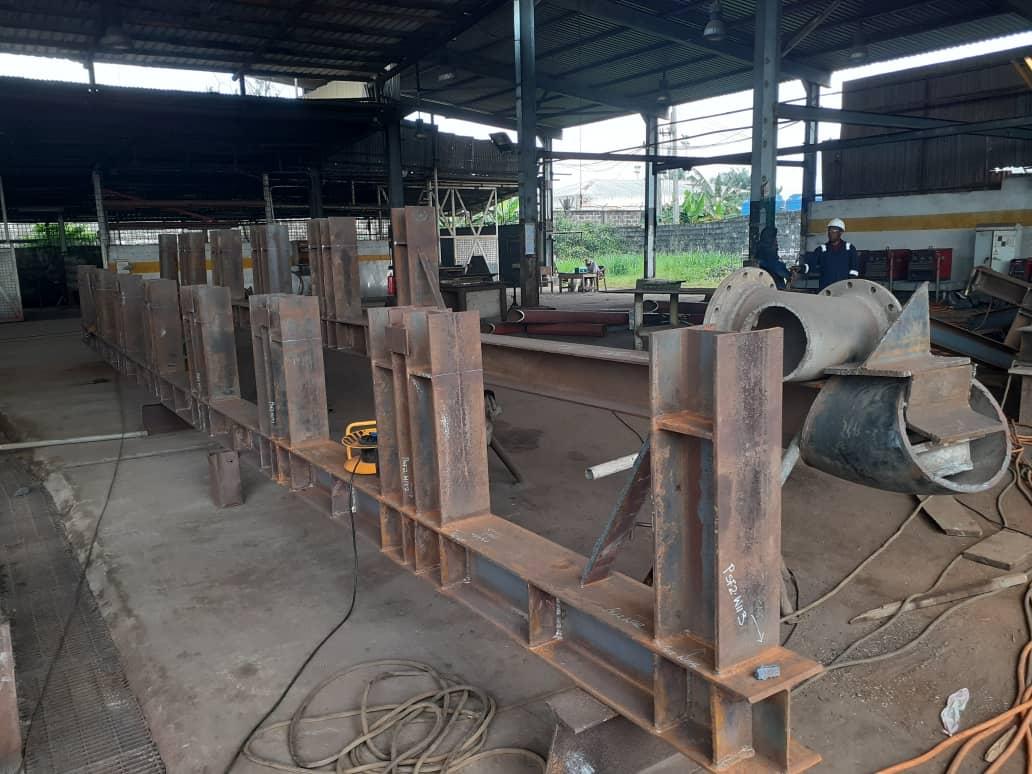 Steel frame with pipe fittings engineered to spec