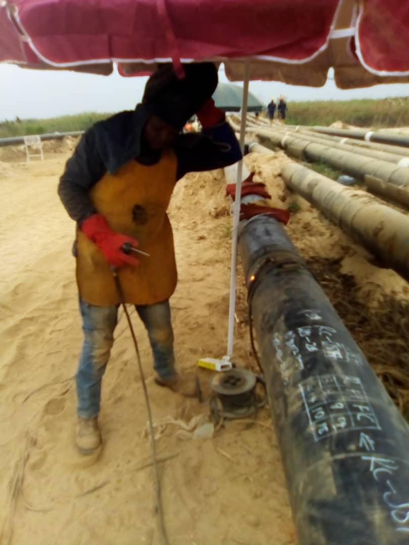 Field weld inspection along the pipeline route